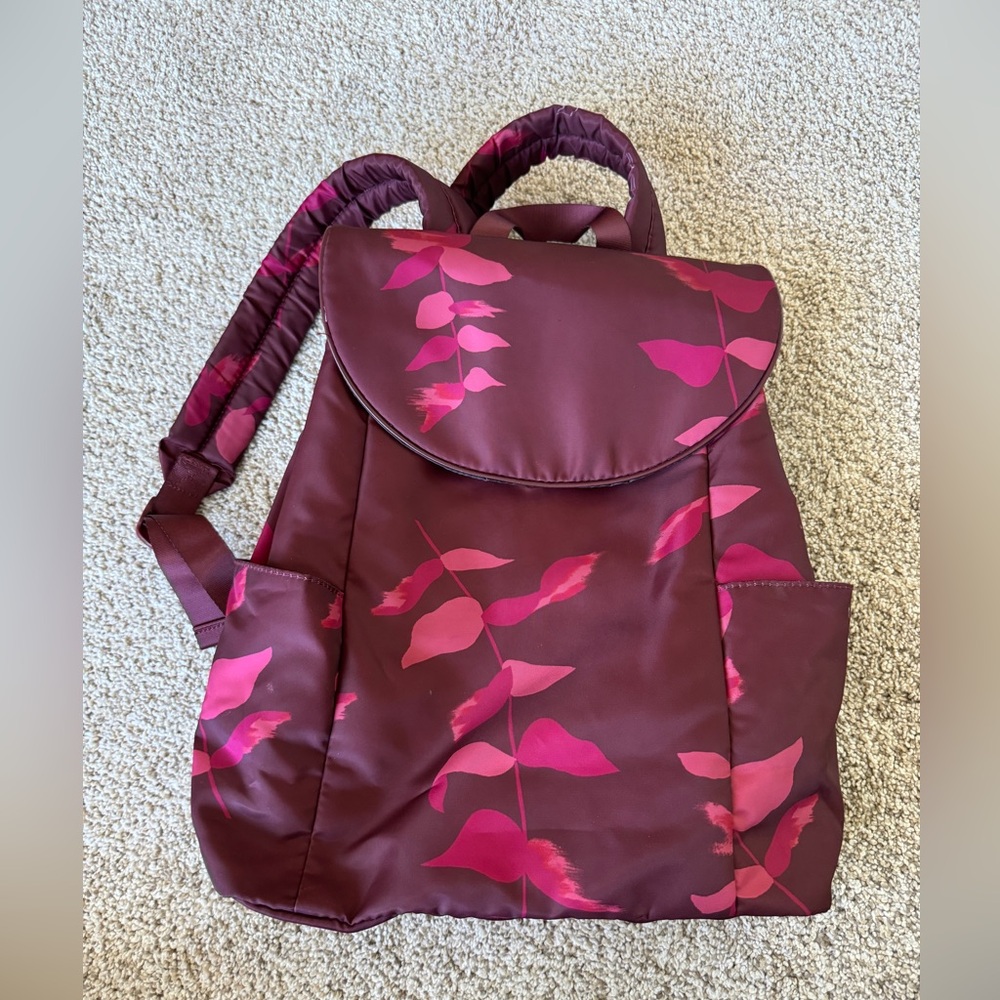 “a new day” backpack in GREAT condition. Perfect backpack for travel or school.